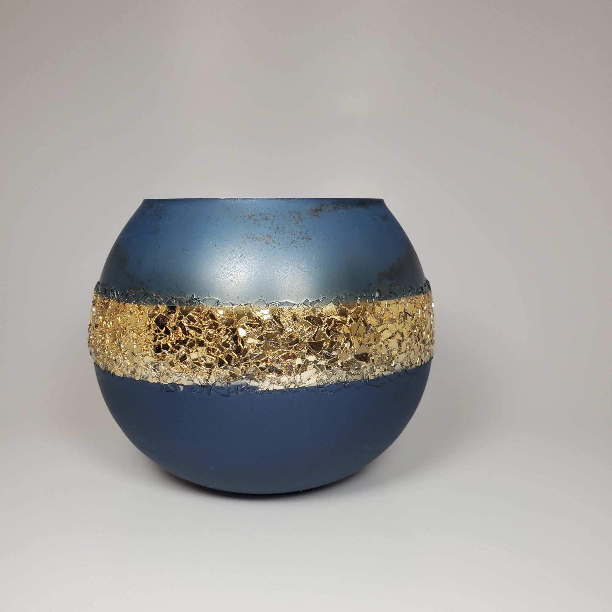 Blue and gold glass candle holder view